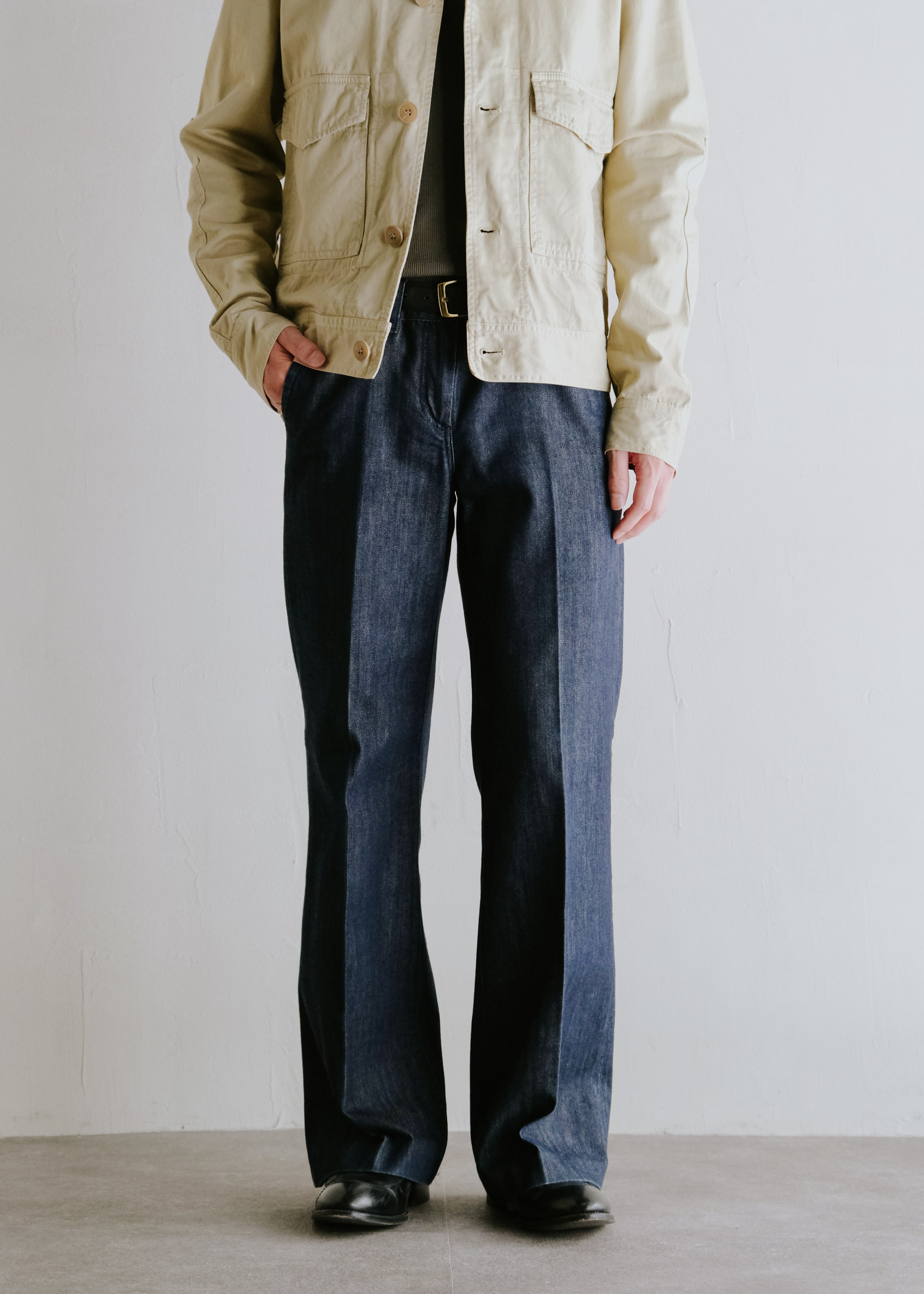 center creased boots cut denim trousers