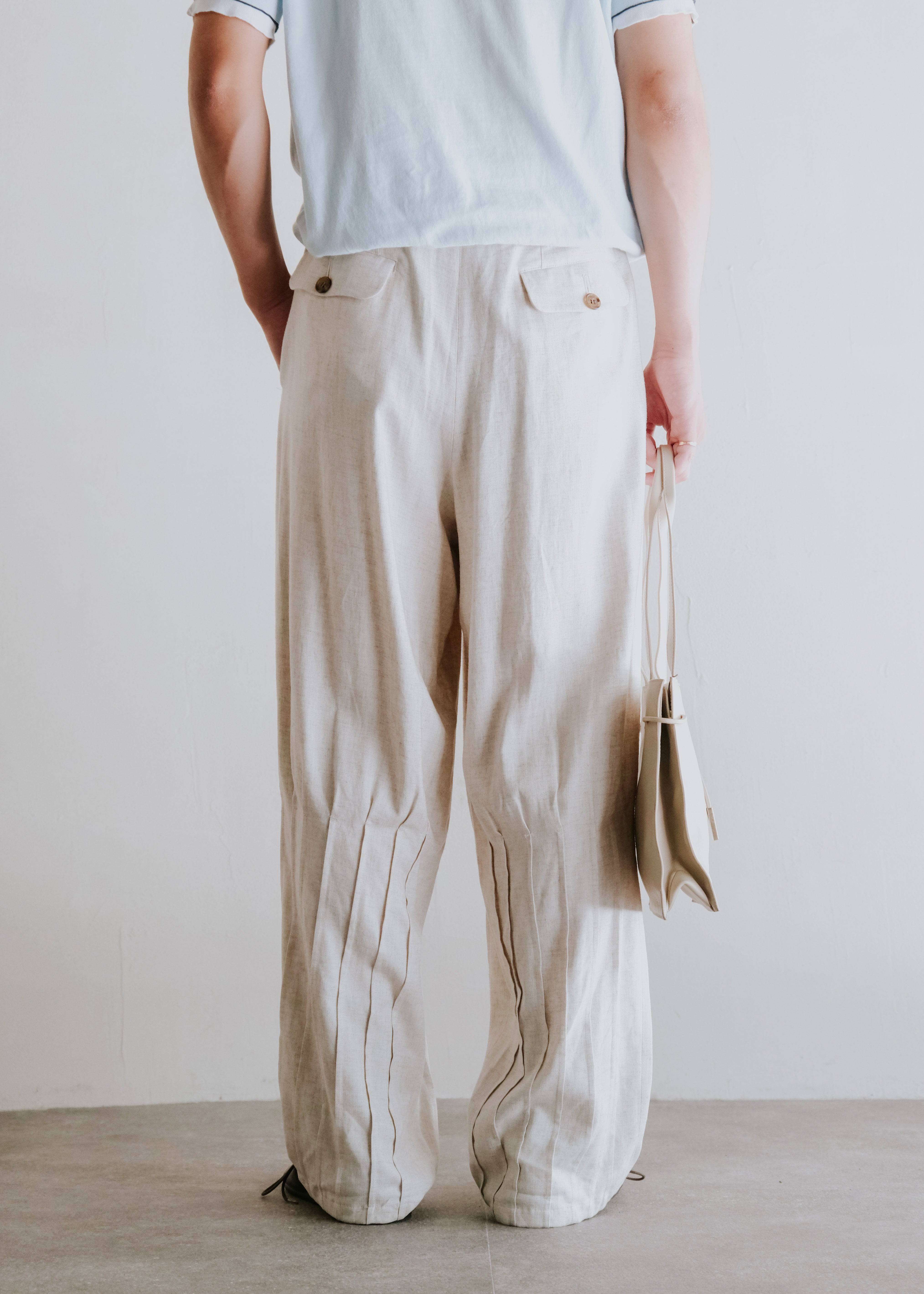 HOMO LUDENS 26SS pintuck linen slacks / Ivory