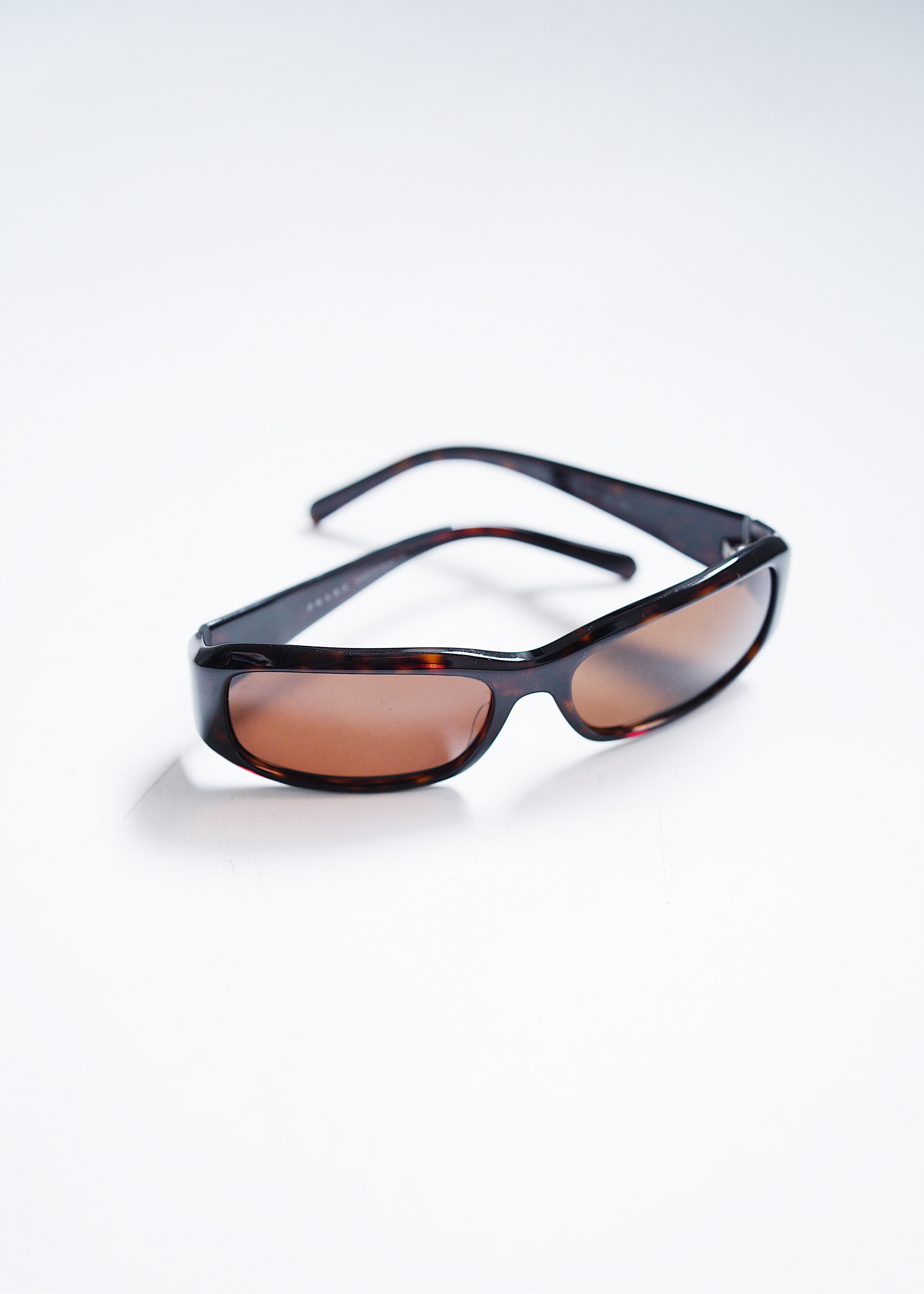PRADA clear frame sunglasses