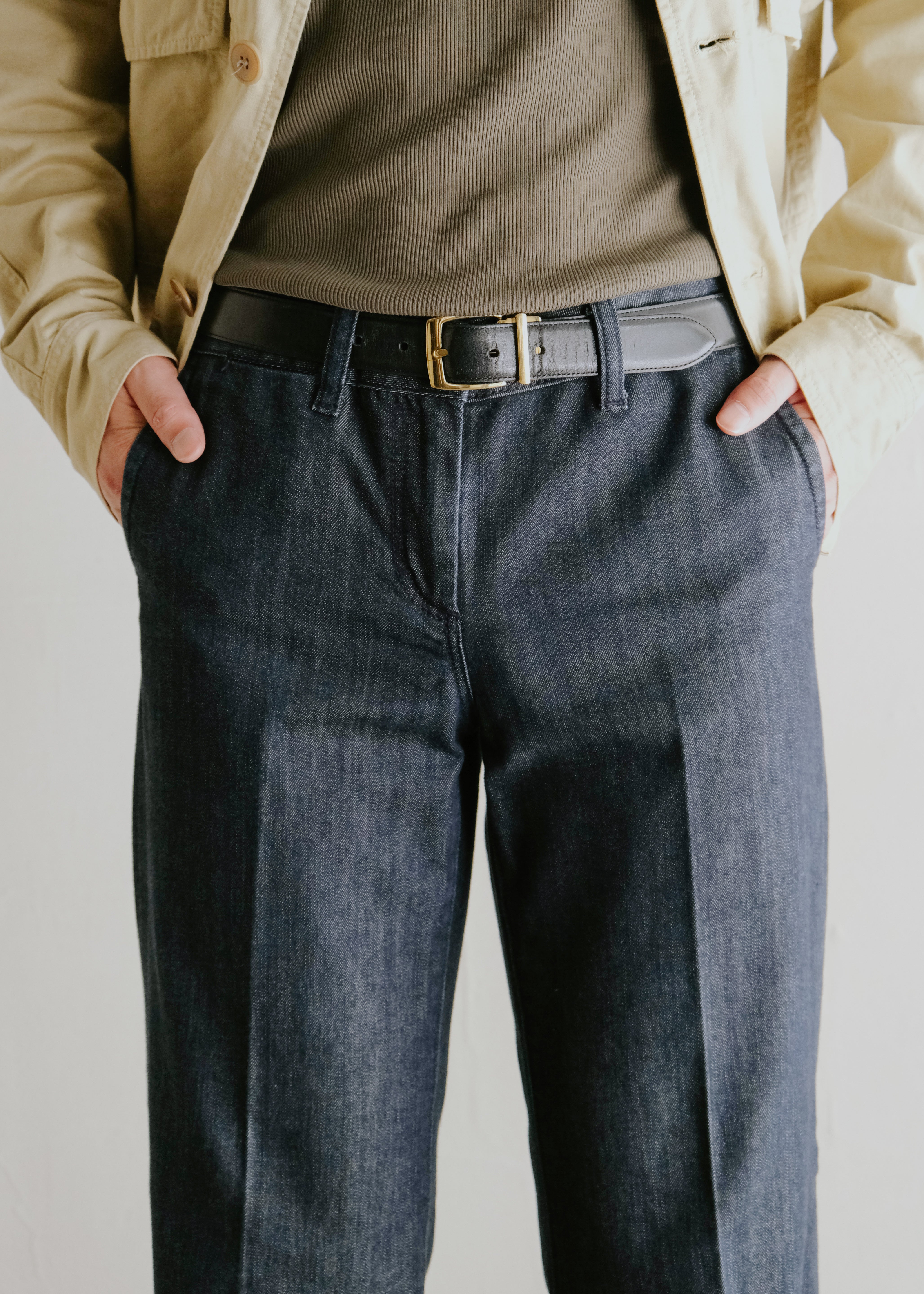center creased boots cut denim trousers