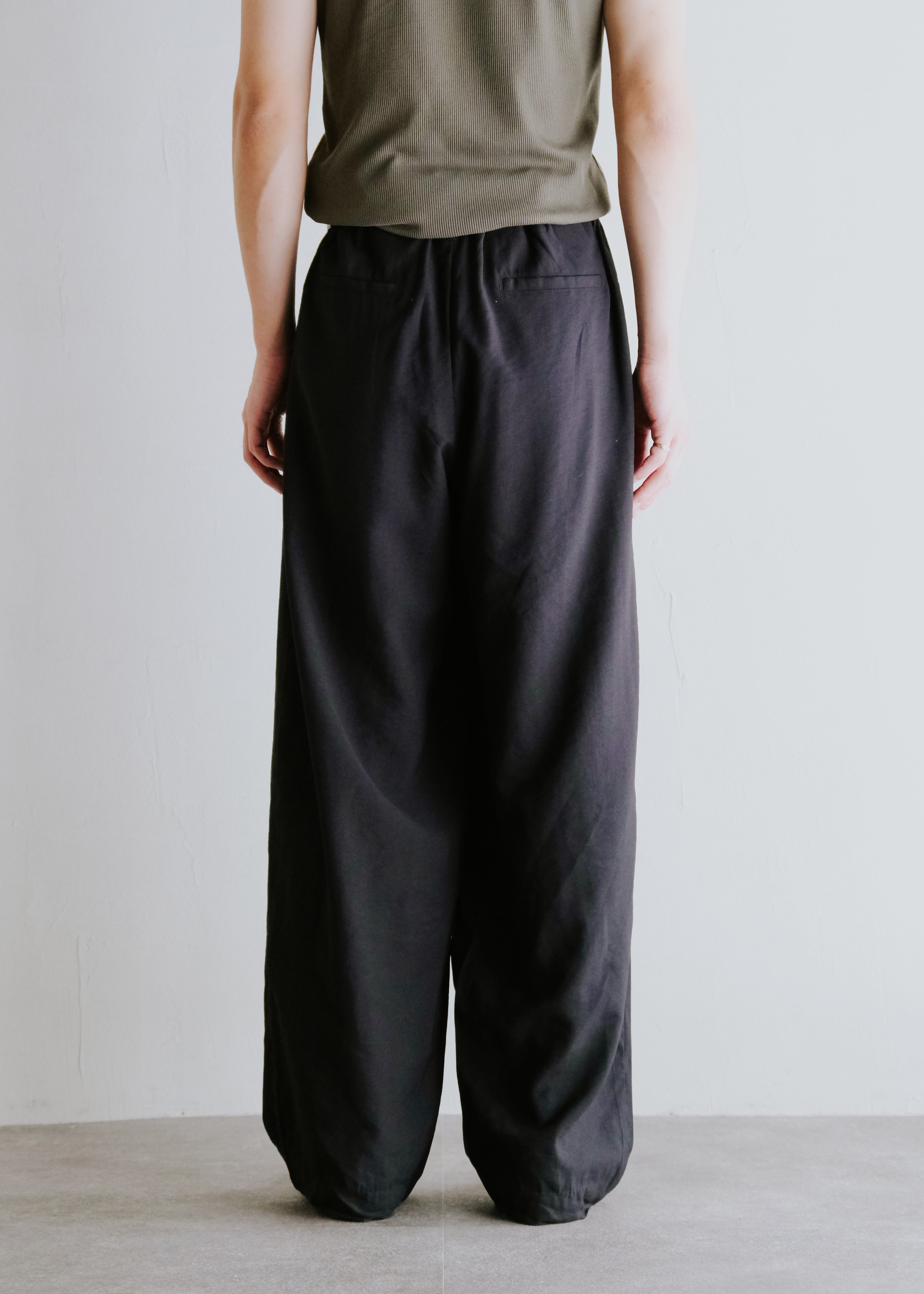 two tucked rayon slacks