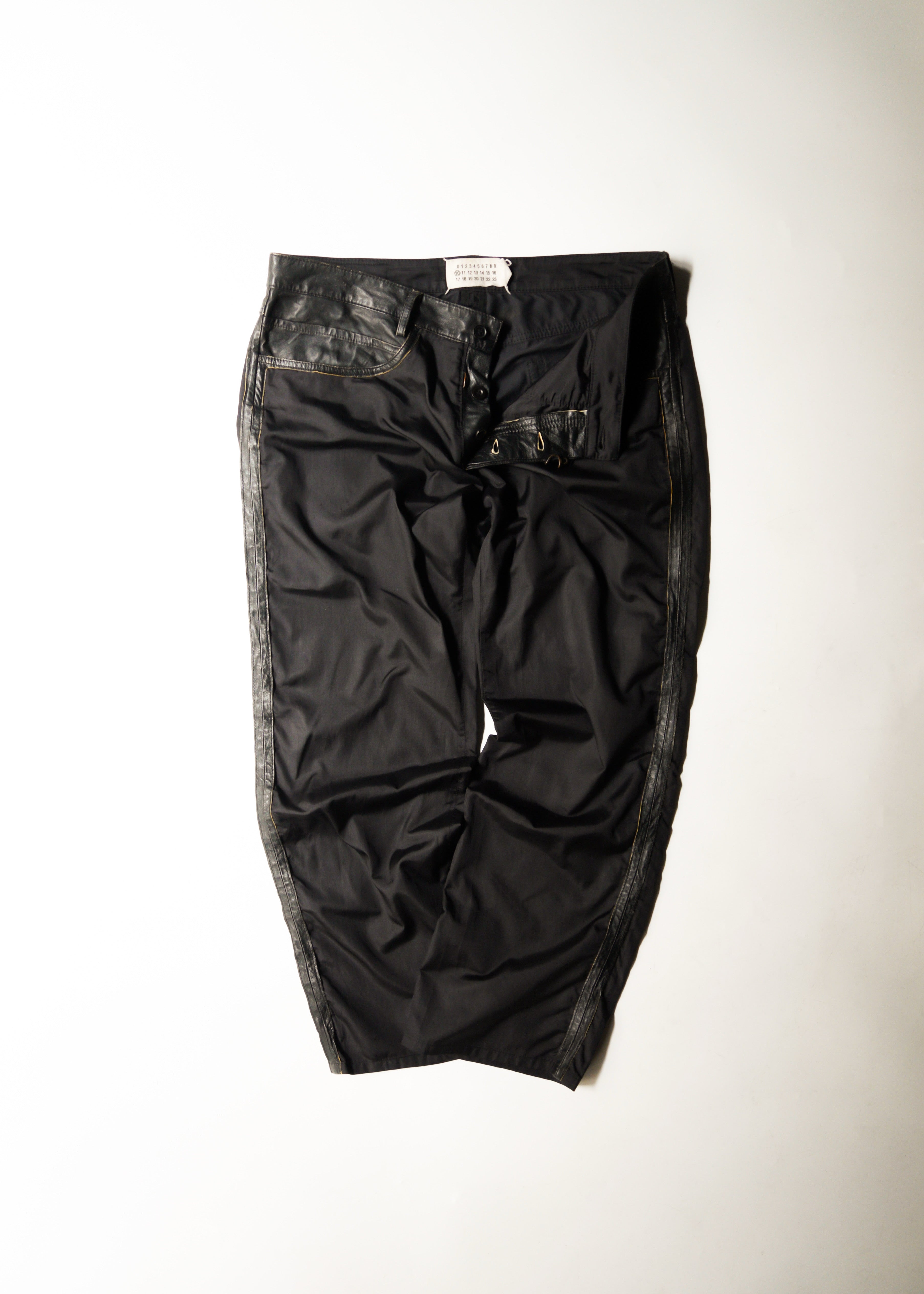 Martin Margiela 07SS switching leather nylon trousers