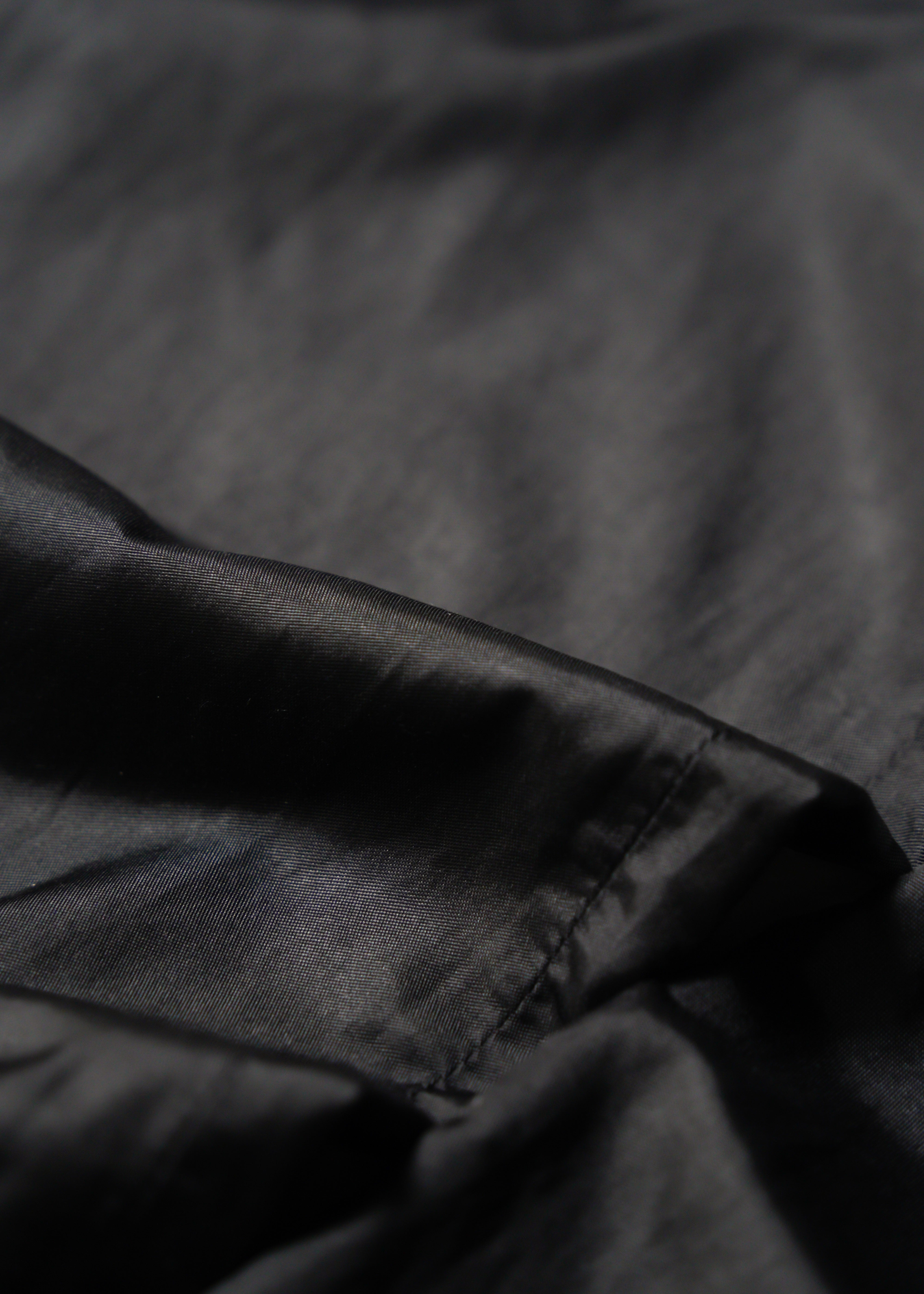Martin Margiela 07SS switching leather nylon trousers