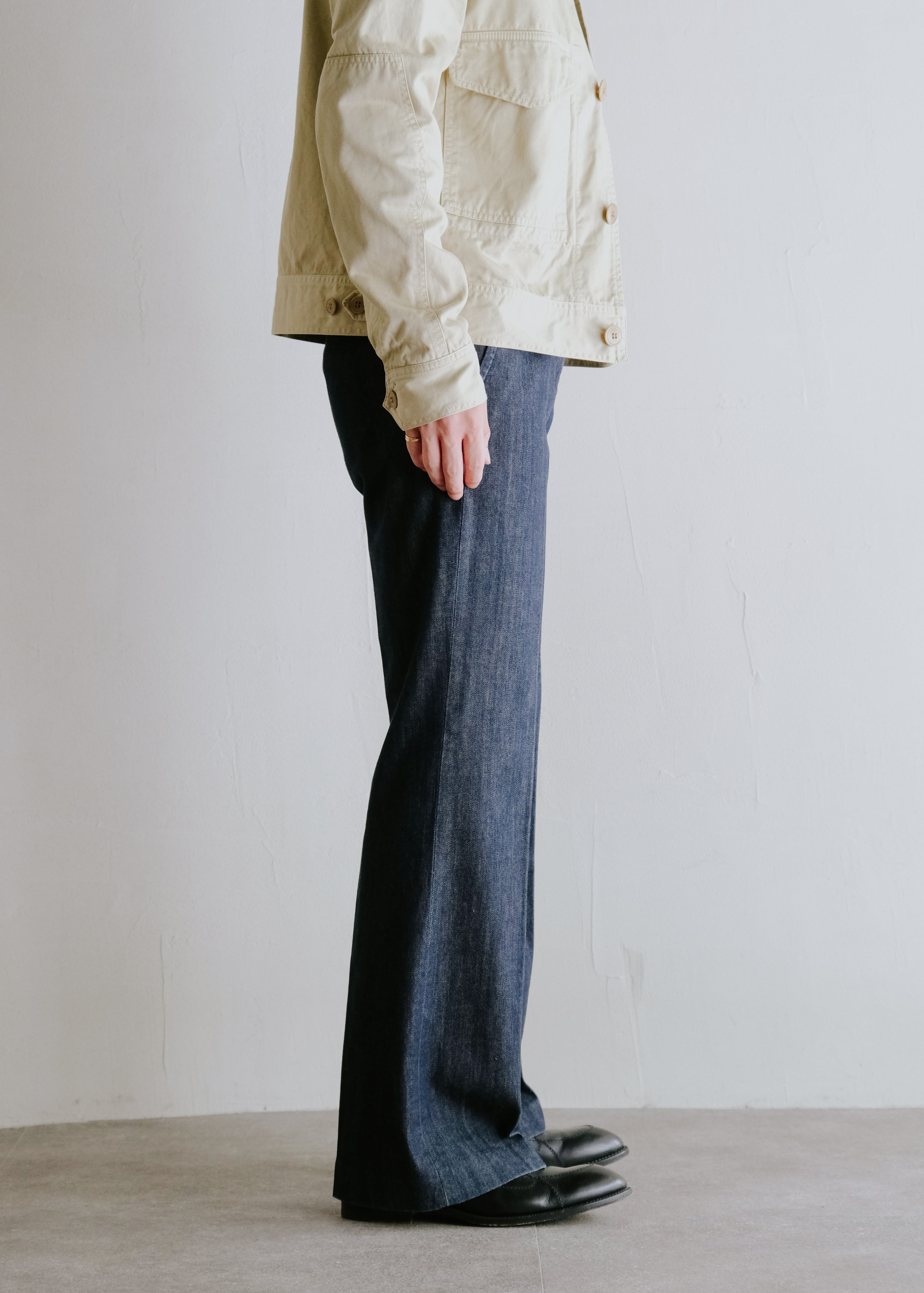 center creased boots cut denim trousers