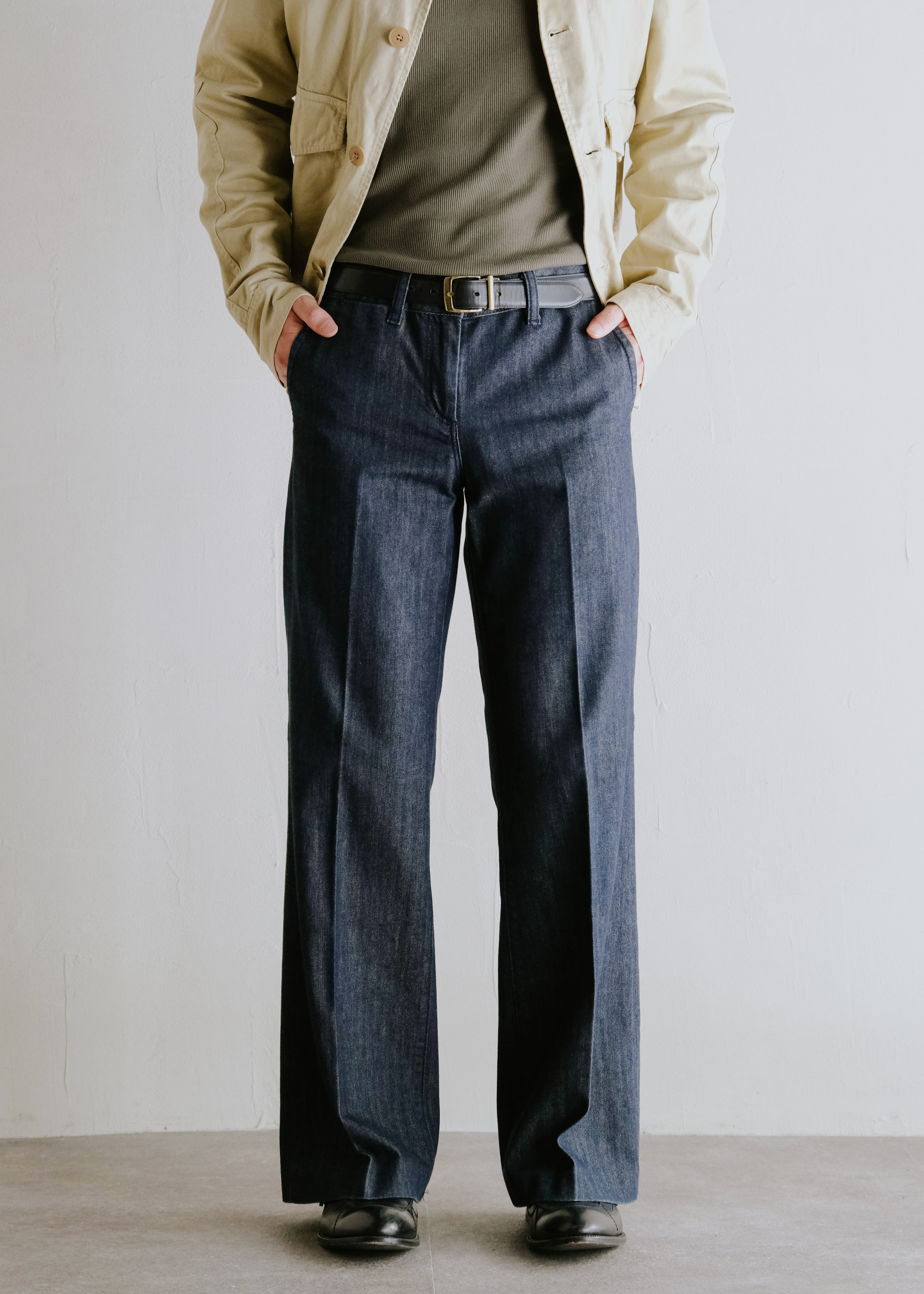 center creased boots cut denim trousers