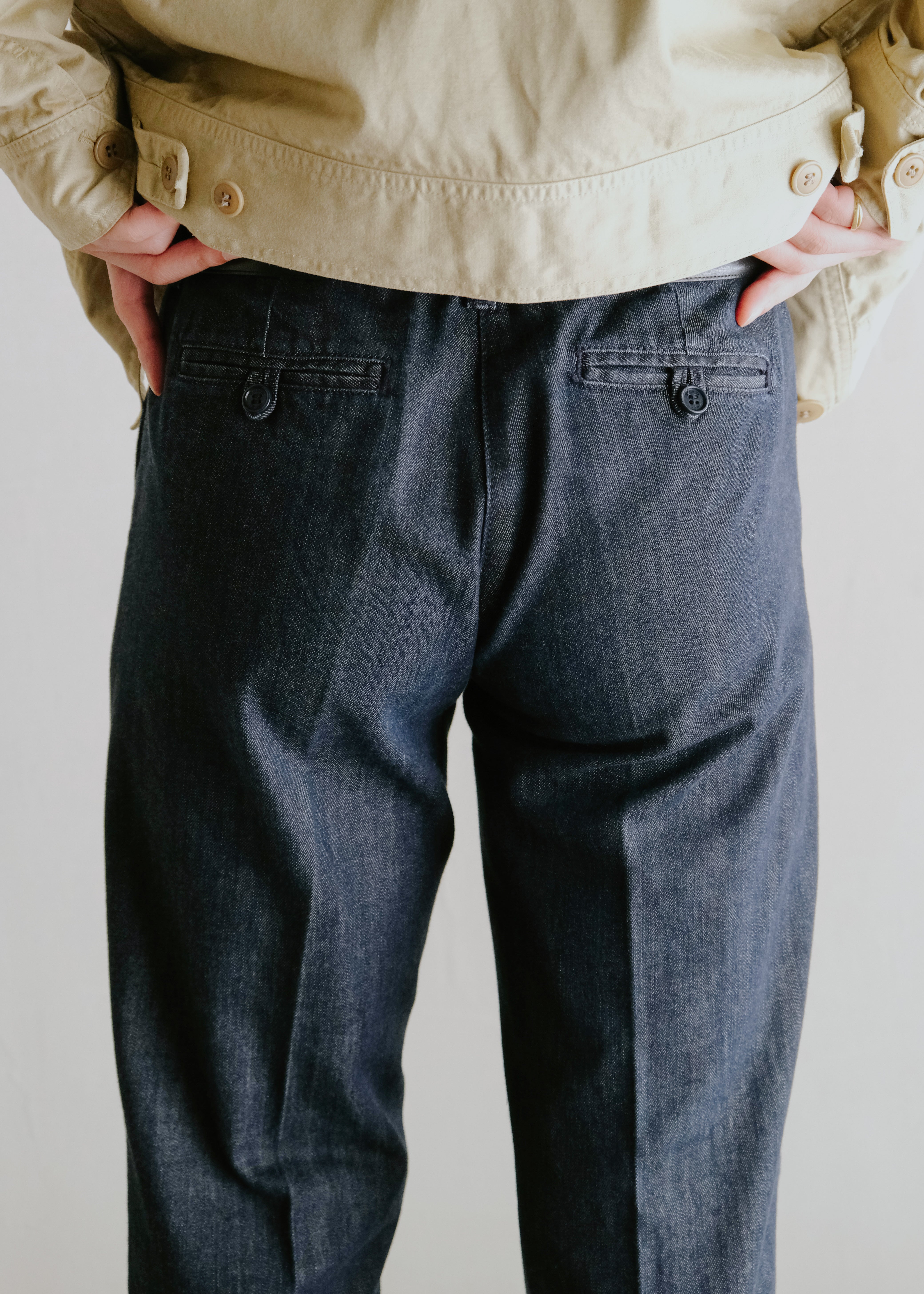 center creased boots cut denim trousers