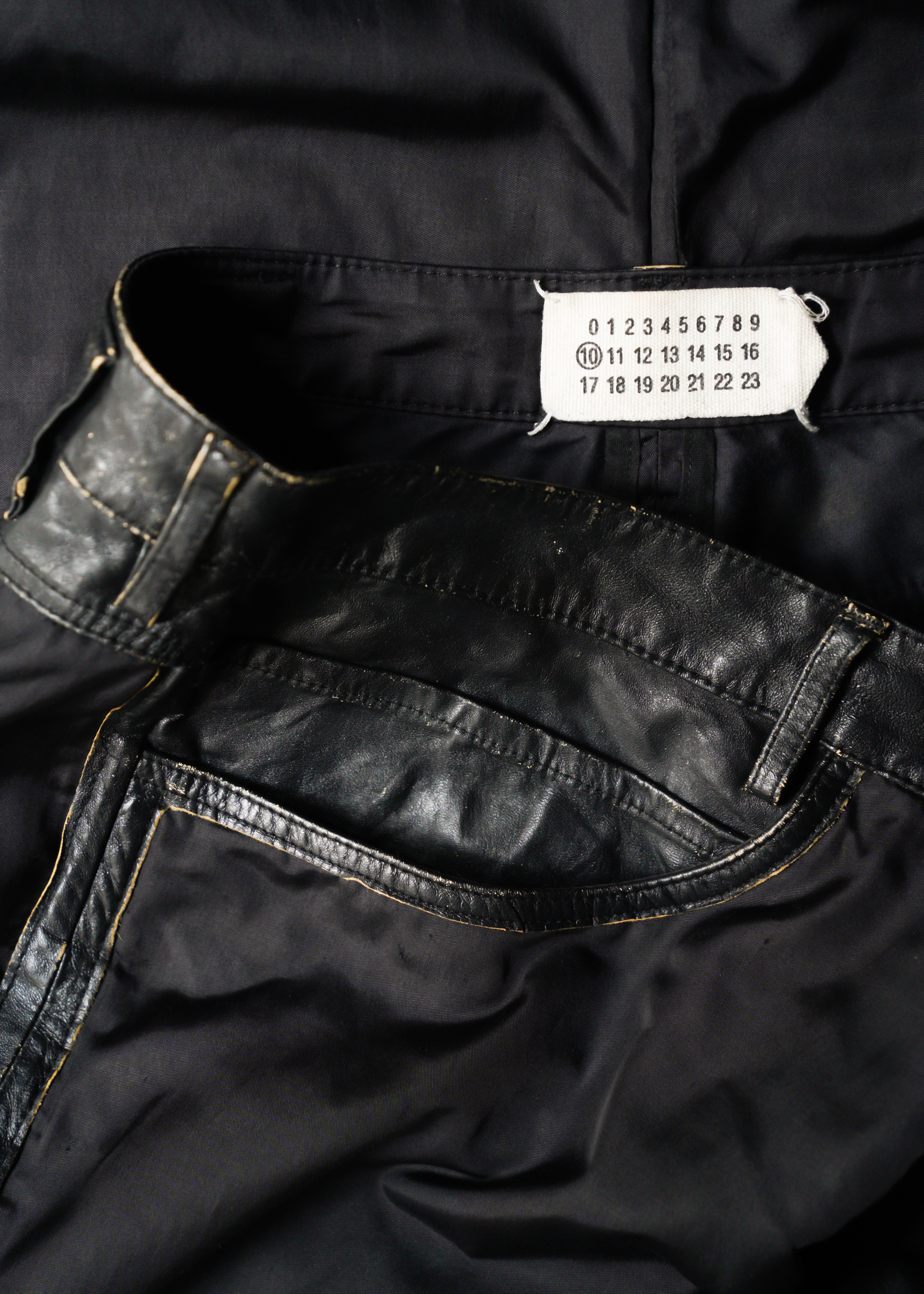 Martin Margiela 07SS switching leather nylon trousers