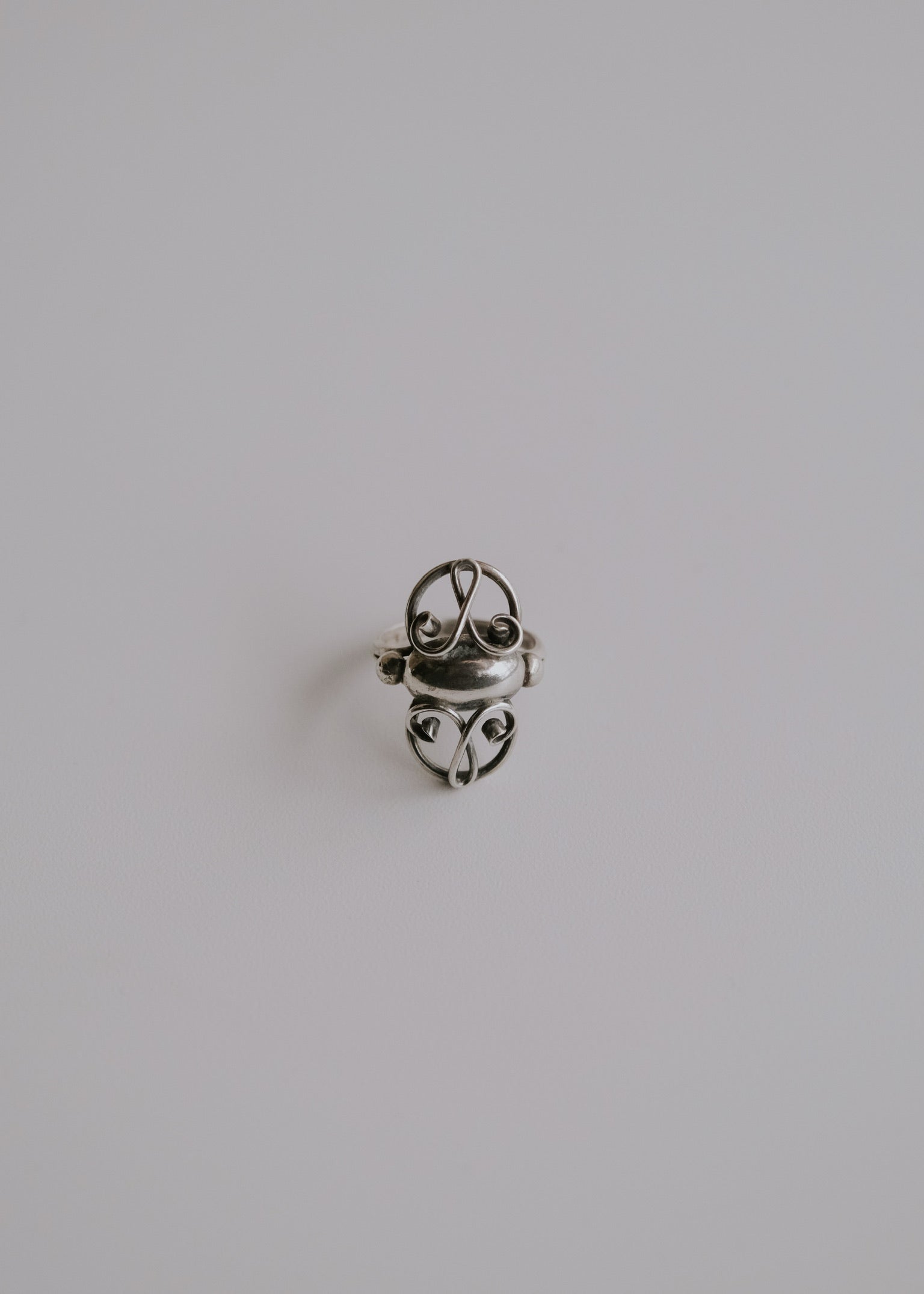 10's Denmark antique symmetrical volute ring